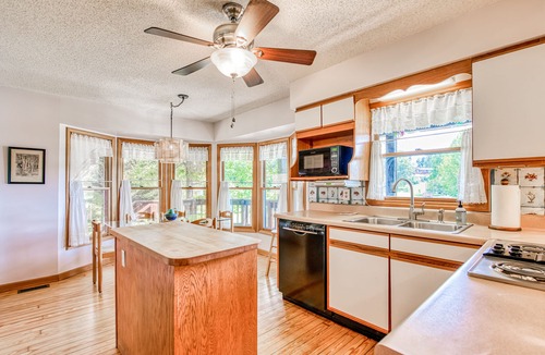 Lake Junaluska House | Lakeside retreat with water views, pool, wraparound deck, patio & game room