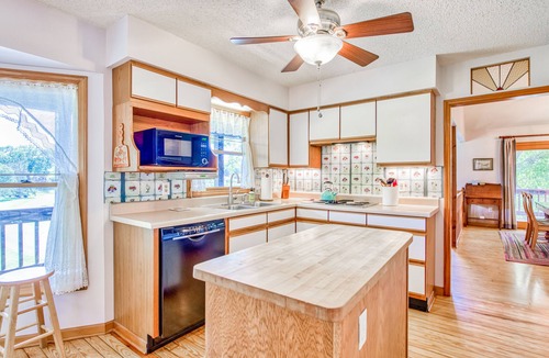 Lake Junaluska House | Lakeside retreat with water views, pool, wraparound deck, patio & game room