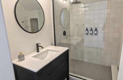 Regina Apartment | Lakeview Coach House. Cozy, private, studio laneway suite with private parking.
