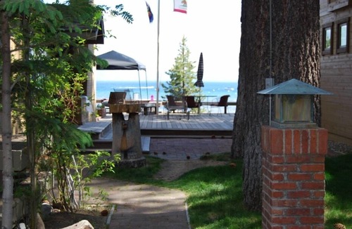 Coffeyville Cottage | Lakeview cottage-steps to beach -shared Lakefront deck! Dog ok