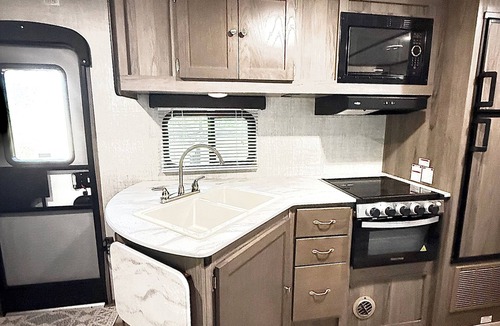 Bivins RV Rental | Lakeview hideaway waterfront camper