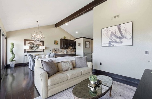 Prairie Creek Condo | Lakeview Home in Rogers with Firepit & Balcony