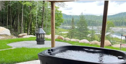 Sainte-Adele Ski Chalet | Lakeview Mid Century Luxury Cottage