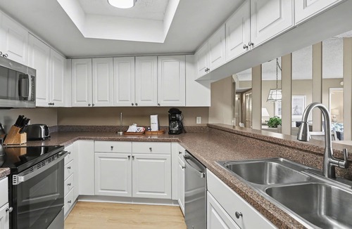 Sunset Beach Condo | Land's End 401 building 1 Top Floor with Gulf Views|Across from Pool!
