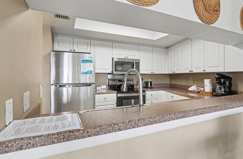 Sunset Beach Condo | Land's End 401 building 1 Top Floor with Gulf Views|Across from Pool!