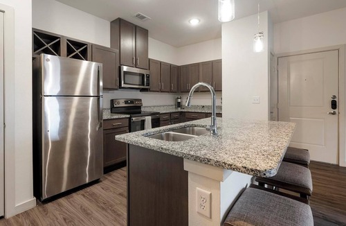 Buda Apartment | Landing | Beautiful 1BD, Game Room, Gym