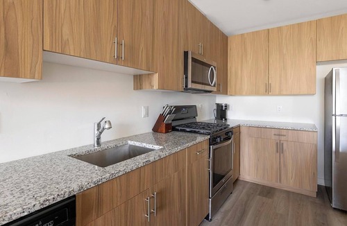Carteret Apartment | Landing | Modern 1BD, Gym, Courtyard