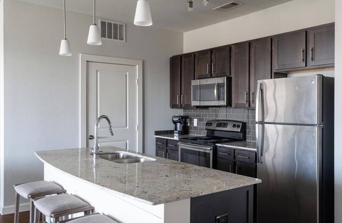 Buda Apartment | Landing | Modern 1BD, Yoga Studio, Gym