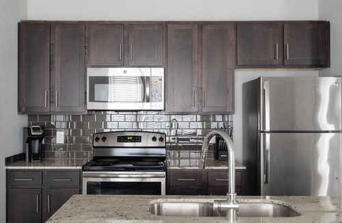 Buda Apartment | Landing | Modern 1BD, Yoga Studio, Gym
