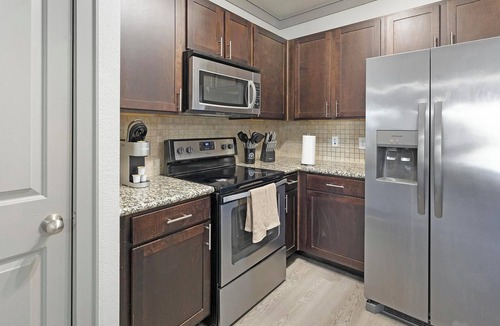 Northeast Carrollton Apartment | Landing | Modern 2BD, Pool, Gym