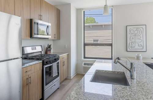 Carteret Apartment | Landing | Modern 2BD, Rooftop Lounge, Gym