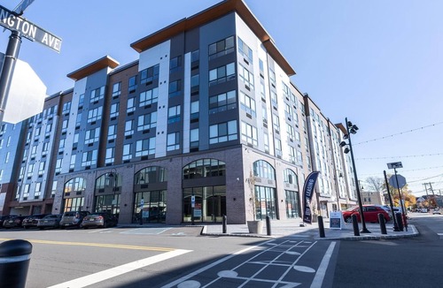 Carteret Apartment | Landing | Modern 2BD, Rooftop Lounge, Gym