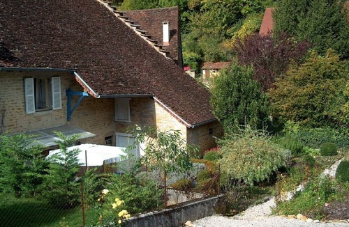 Frontenay House | Landmarked stone house by a stream with extraordinary charm