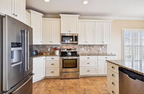 North Myrtle Beach House | Landshark, Luxury Oceanfront Cherry Grove Home with Game Room and Pool