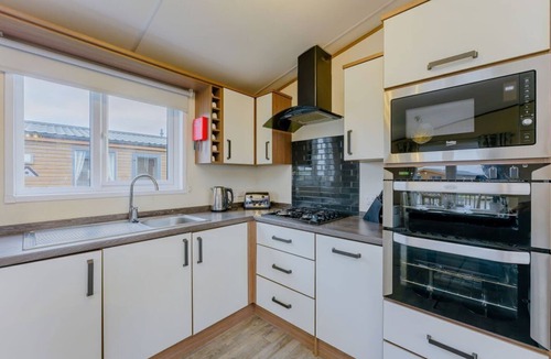 Carlton Miniott Cabin | Larch Waterside Spa (Pet), Thirsk