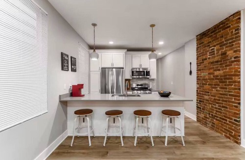 Livingston Park Apartment | Large 3 bedroom with fenced yard and games!
