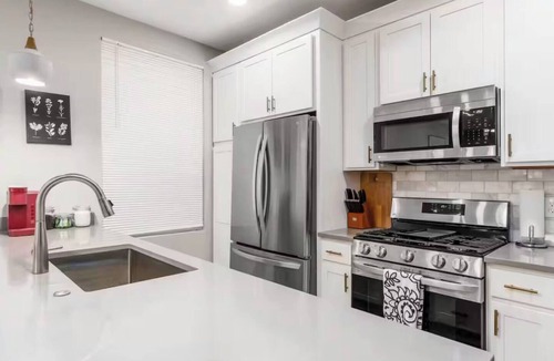 Livingston Park Apartment | Large 3 bedroom with fenced yard and games!