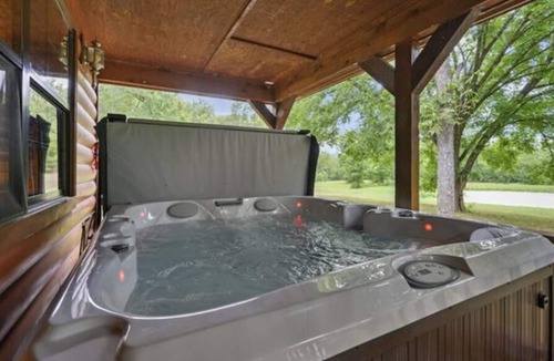 Golden Cabin | Large back porch with new hot tub, internet, pond, secluded, near glover river