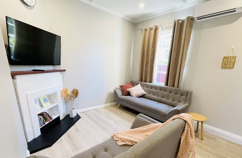 Edwardstown House | Large backyard with outdoor seating and BBQ!