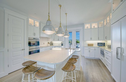 Anna Maria House | Large Canal Front Family Rental on Anna Maria with Pool, Dock and Mini Golf!