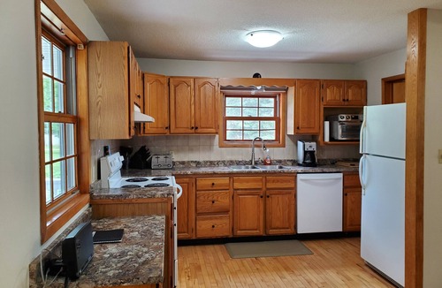 Goulais River Cottage | Large farmhouse style cottage located on three acres of waterfront property.