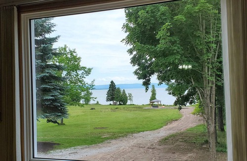 Goulais River Cottage | Large farmhouse style cottage located on three acres of waterfront property.