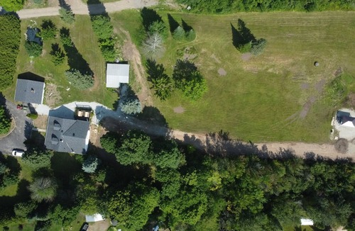 Goulais River Cottage | Large farmhouse style cottage located on three acres of waterfront property.