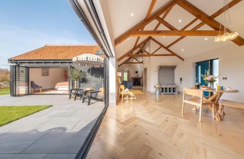 Ipswich House | Large immaculate rural conversion - The Milking Parlour
