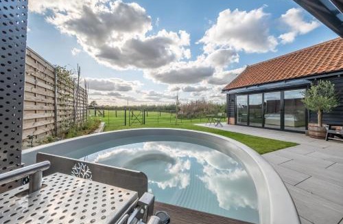 Ipswich House | Large immaculate rural conversion - The Milking Parlour