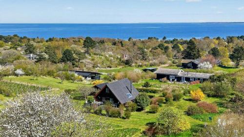 Klint House | Large Log House With Sea Views In Klint Hills