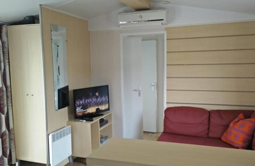 Gastes House | Large mobile homes sleeping 8 with air conditioning in a holiday village