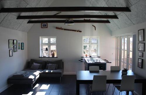 Tommerup House | Large modern family room - “Arnely”