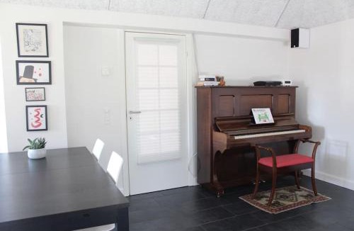 Tommerup House | Large modern family room - “Arnely”