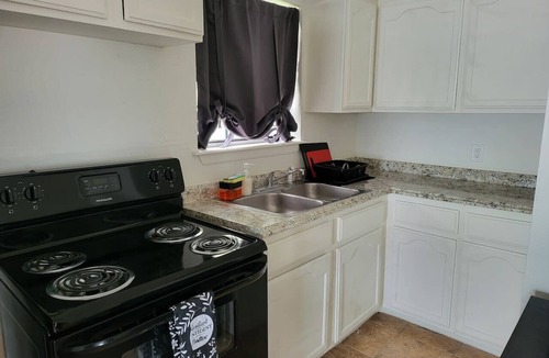 Eastern Division Apartment | Large parking lot/sleeps 8