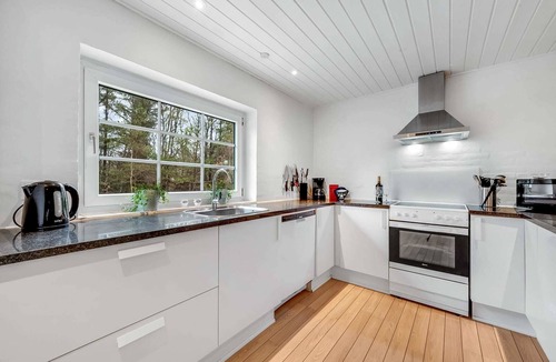 Husby House | Large pool house in quiet Vester Husby with play castle and beach volleyball