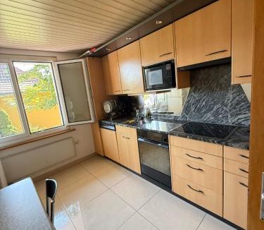 Bolligen Apartment | Large room, shared kitchen and bath, near station