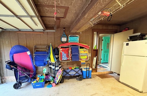 Fernandina Beach House | Latitude Adjustment-One block from the beach, shared pool, one dog allowed.