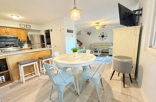 Fernandina Beach House | Latitude Adjustment-One block from the beach, shared pool, one dog allowed.