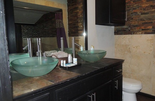 Norman Apartment | Lavender Suite at Whispering Pines Inn