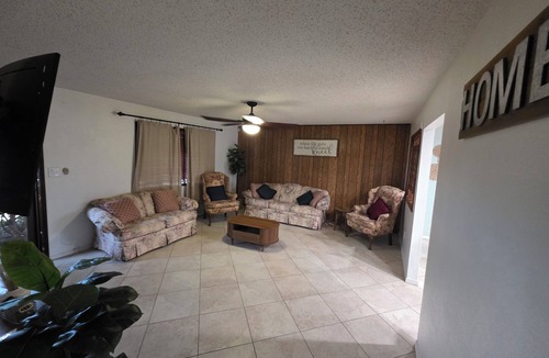 Carlsbad House | Laylas lounge welcomes familes and furr babie as well.
