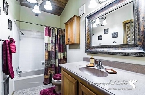 Ruidoso Cabin | Lazy Bear Lodge: 'Relaxation achieved' with hot tub.