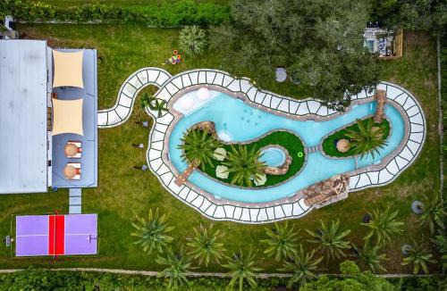 Golden Glades House | Lazy River Villa by Glam Homes