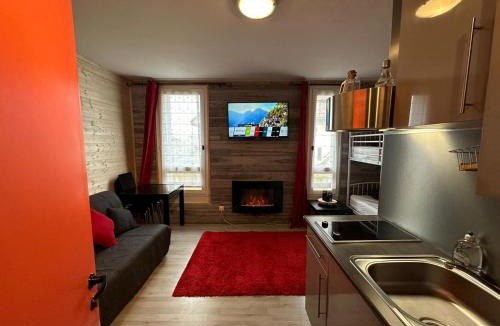 Guzet Neige Apartment | Le Chaleureux Cocon Rouge