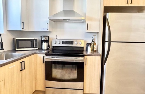 Ste. Foy Apartment | Le Cozy – with EV Charger (Level 2)