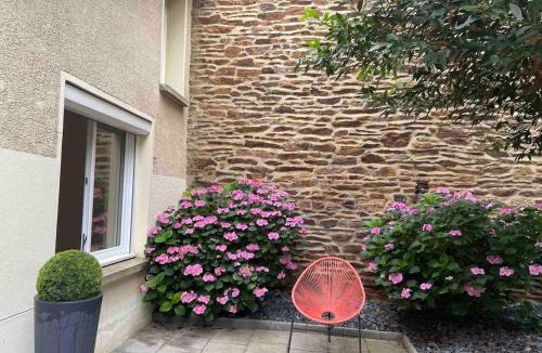 Colombier - Champ de Mars Apartment | Le Gurvand - Appartement à la gare avec jardin