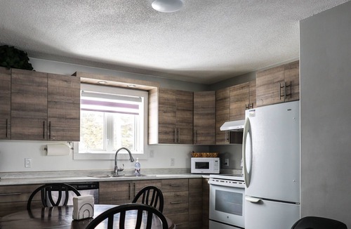 Cochrane House | Le Lodge - Spacious Home