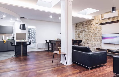 Saint-Merri Apartment | Le Marais: Where Paris Wears Its Soul-A Chic Parisian Hideaway/Triplex+Patio+A/C