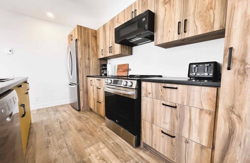 Baie-St-Paul Ski Chalet | Le Verseau 148: Hot Tub, Forest Views & BBQ