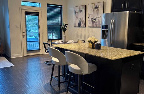 Legacy Town Center North House | Legacy Haven is cozy-chic townhome steps from Plano's top dining and boutiques.