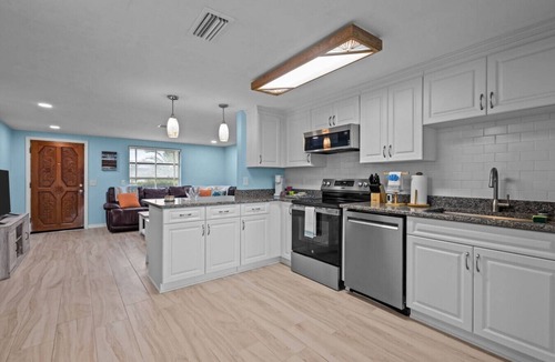 Port Richey Apartment | Leisure Isle 1: Waterfront! 2BR w/Firepit & Grill!